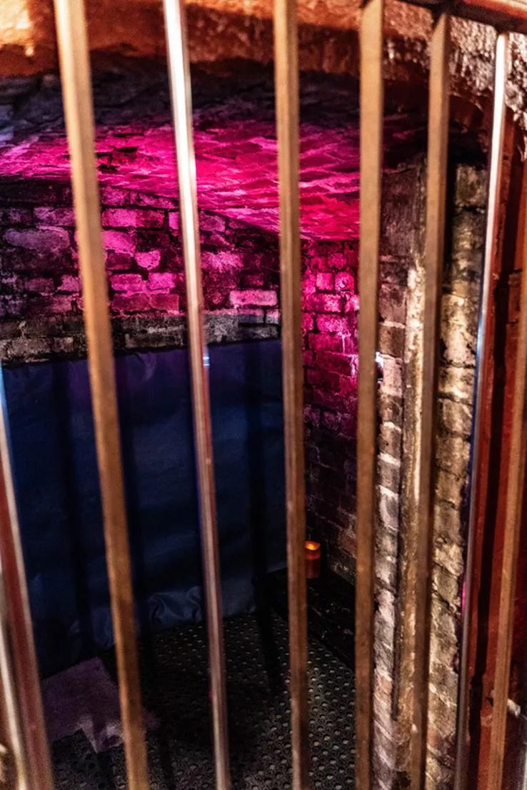 The Naughty Cell — barred cell in neon light